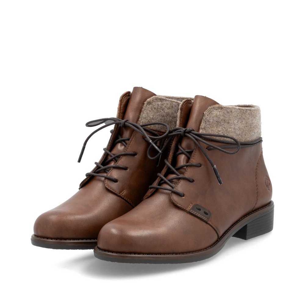 Brown remonte women´s ankle boots D0F78-22 with a shaft collar as well as a zipper. Shoes laterally.