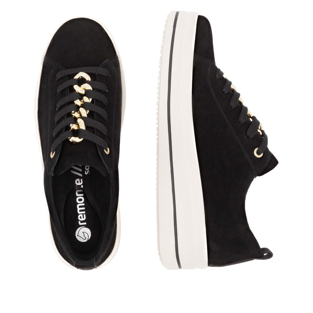 Jet black remonte women´s sneakers D1C03-02 with chain element as well as a zipper. Shoe from the top, lying.