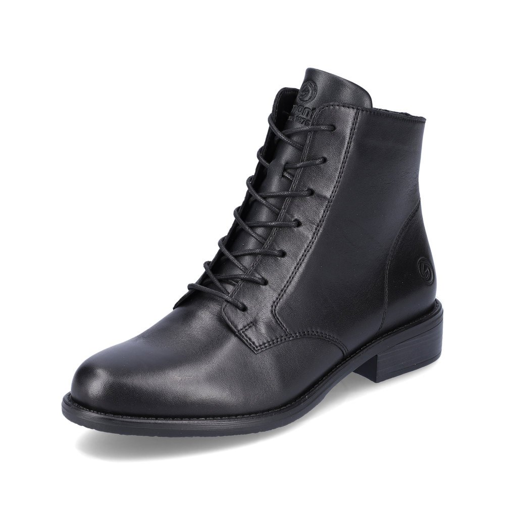 Bottines remonte noires pour femme D0F73-01 avec fermeture éclair. Chaussure inclinée sur le côté.