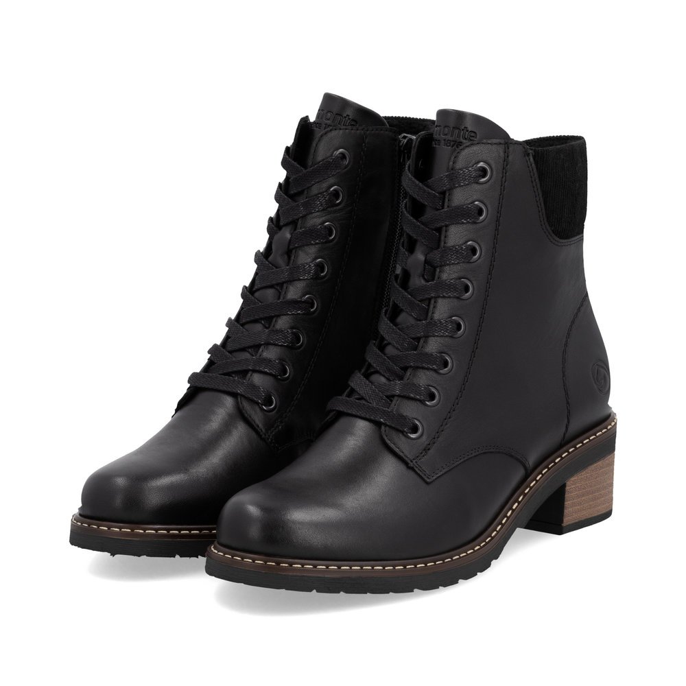 Bottes à lacets remonte noires pour femme D1A70-00 avec fermeture éclair. Chaussures inclinées sur le côté.