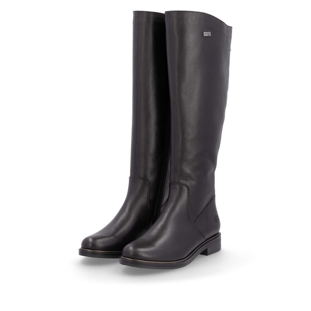 Bottes à tige haute remonte noires pour femme D8391-00. Chaussures inclinées sur le côté.