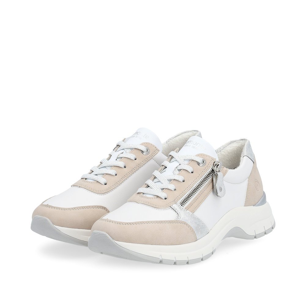White remonte women´s sneakers D0G09-81 with a zipper and extra width H. Shoes laterally.