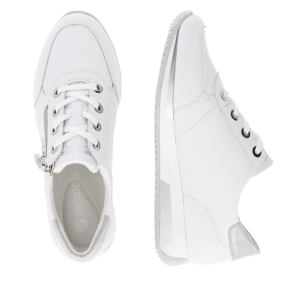 White remonte women´s sneakers D0H11-80 with zipper and a soft exchangeable footbed. Shoe from the top, lying.