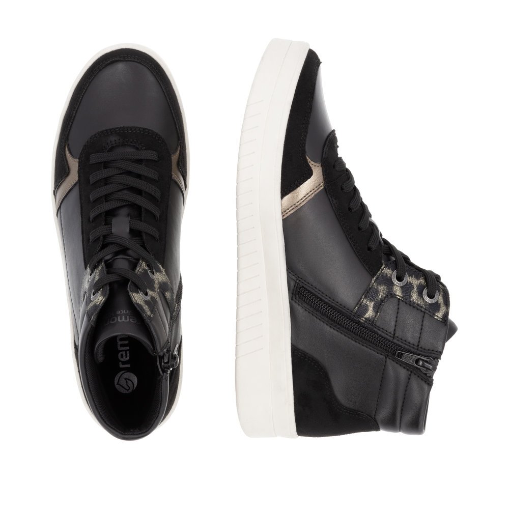 Asphalt black remonte women´s sneakers D0J71-03 with animal print as well as zipper. Shoe from the top, lying.