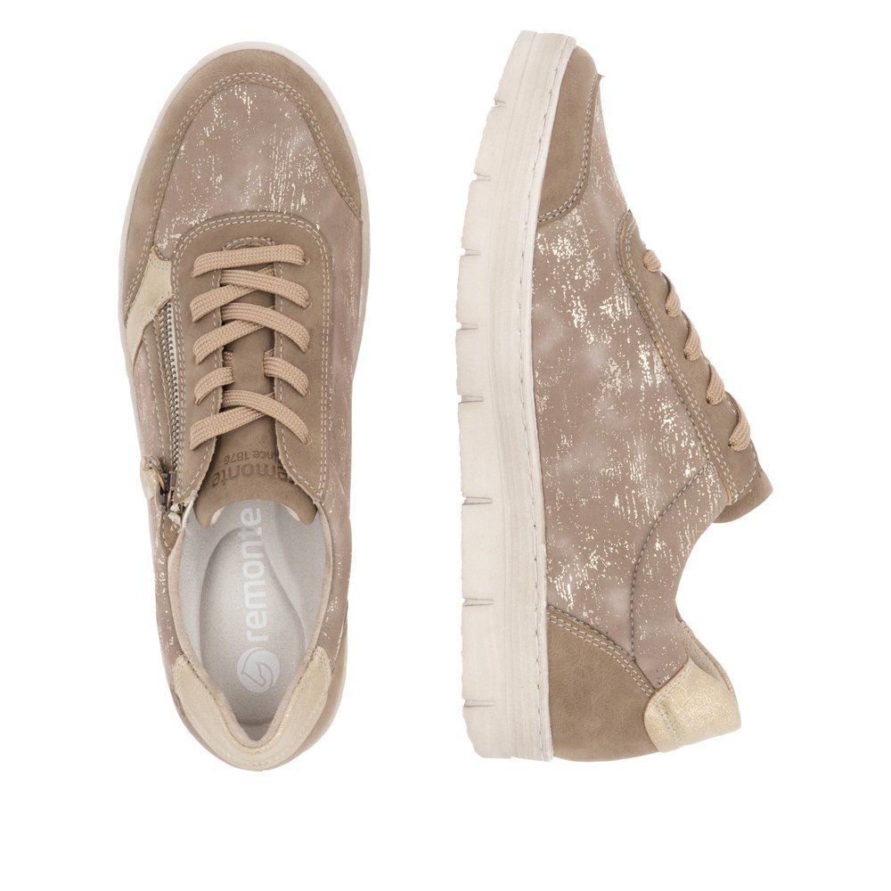 Sand beige remonte women´s sneakers D5831-62 with zipper as well as a padded insole. Shoe from the top, lying.