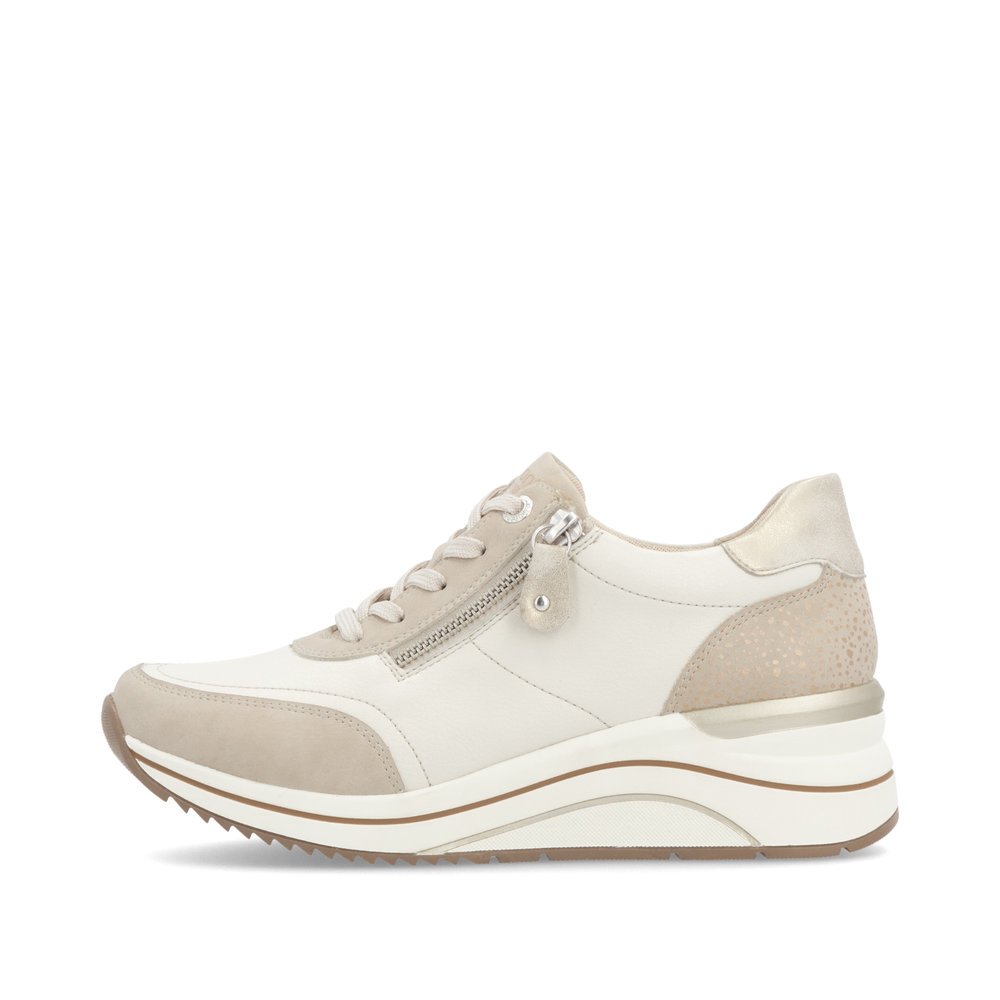 Beige remonte women´s sneakers D0T00-60 with a zipper as well as extra width H. Outside of the shoe.