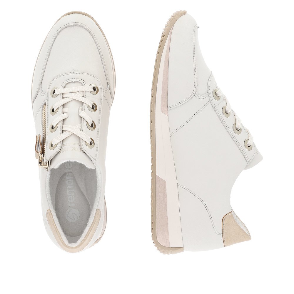 White remonte women´s sneakers D0H11-81 with zipper and soft exchangeable footbed. Shoe from the top, lying.