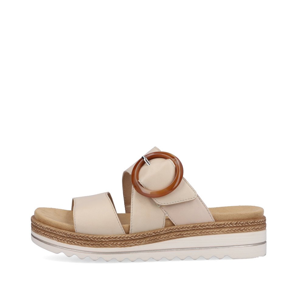 Vanilla beige remonte women´s mules D0Q51-80 with a hook and loop fastener. Outside of the shoe.
