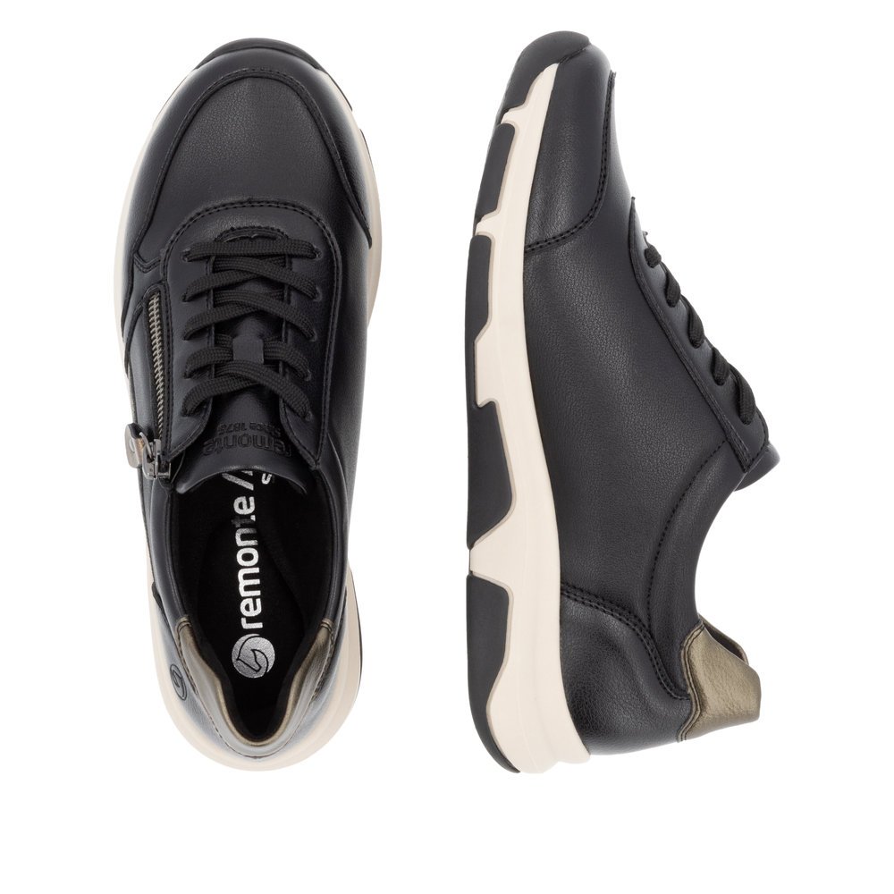 Black vegan remonte women´s sneakers D1S01-03 with animal print as well as a zipper. Shoe from the top, lying.