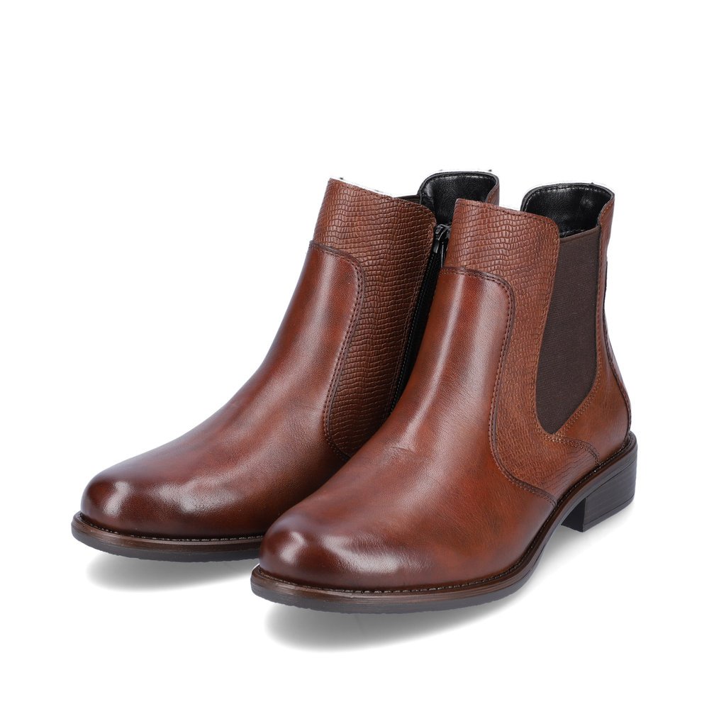 Bottes Chelseas remonte marron pour femme D0F70-22 avec fermeture éclair. Chaussures inclinées sur le côté.