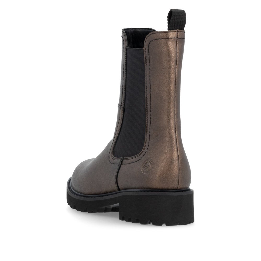 Brown remonte women´s Chelsea boots D8694-90 with zipper as well as comfort width G. Shoe from the back.