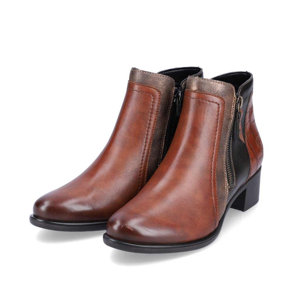 Bottines remonte marron pour femme R5172-23 avec fermeture éclair. Chaussures inclinées sur le côté.