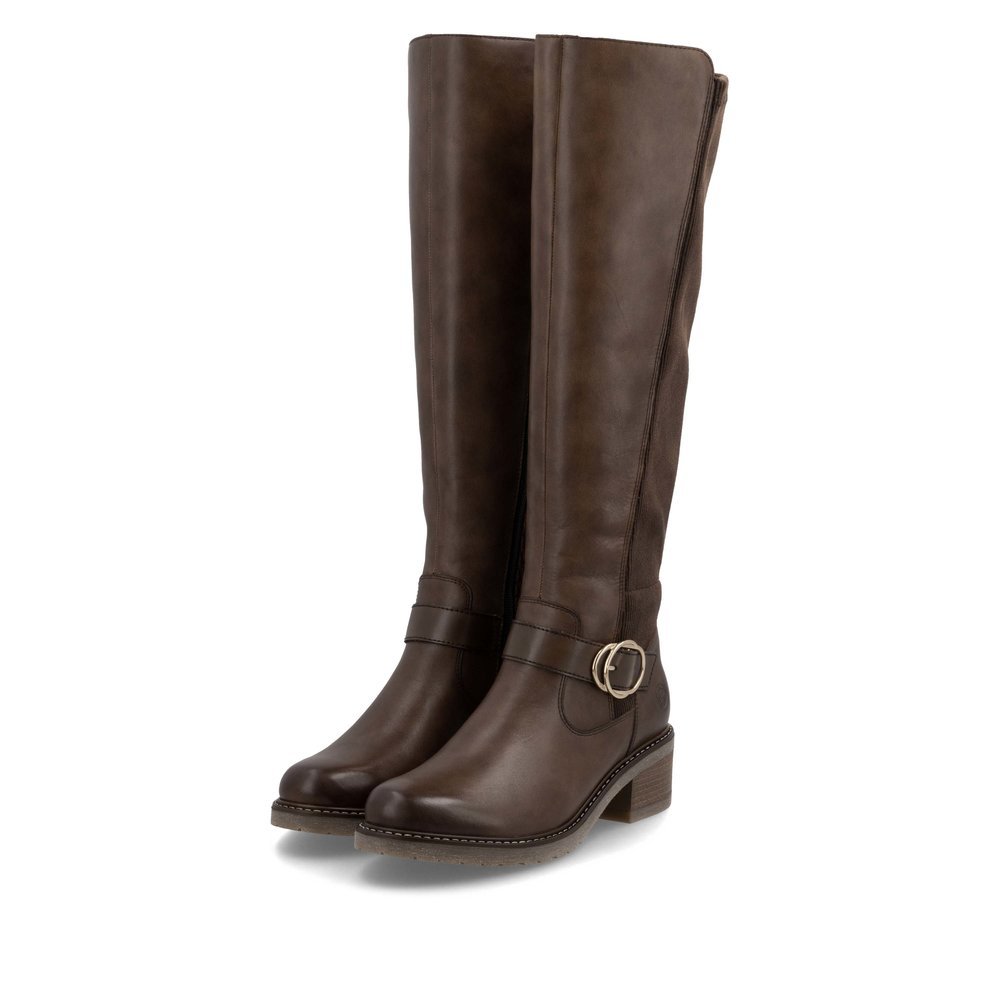 Chocolate brown remonte women´s high boots D1A73-25 with a round decorative buckle. Shoes laterally.