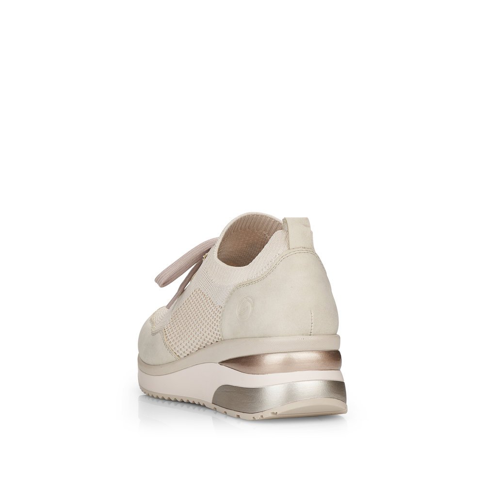 Cream beige remonte women´s sneakers D2406-60 with an elastic insert and mesh look. Shoe from the back.