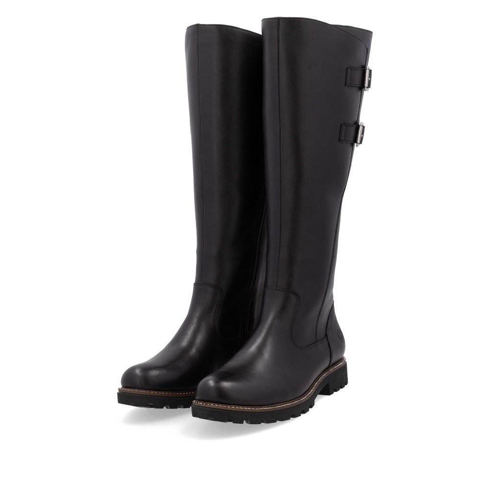 Black remonte women´s high boots D8486-00 with decorative buckles as well as zipper. Shoes laterally.