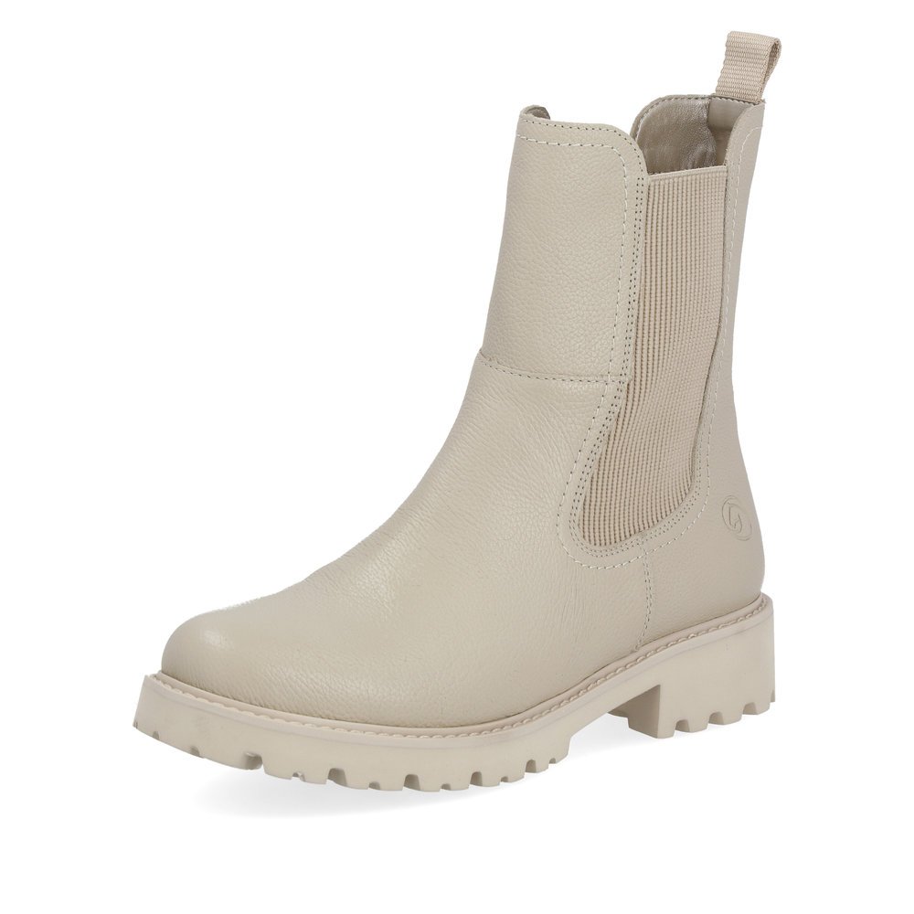 Beige remonte women´s Chelsea boots D8694-60 with zipper as well as comfort width G. Shoe laterally.