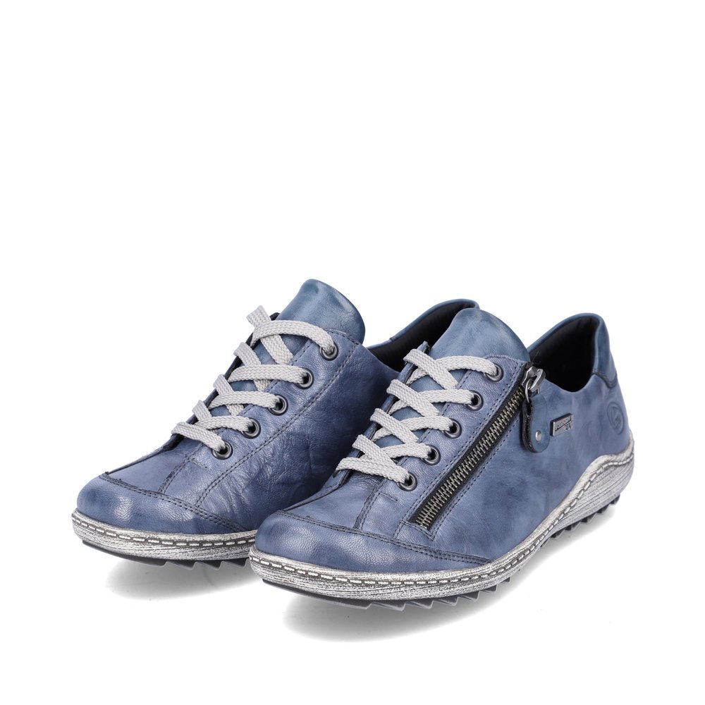 Blaue remonte Damen Schnürschuhe R1402-15 mit wasserabweisender TEX-Membran. Schuhpaar seitlich schräg.