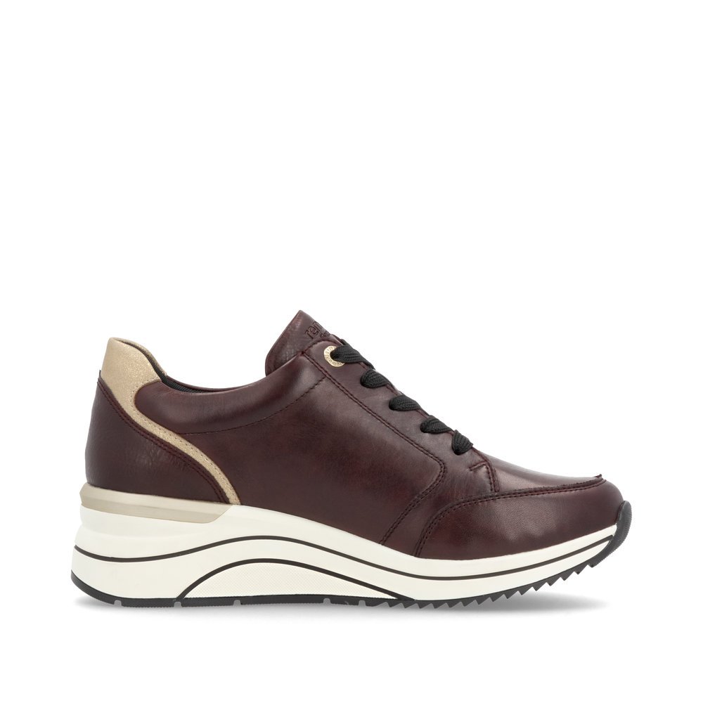 Maroon remonte women´s sneakers D0T03-35 with a remonte pendant as well as a zipper. Shoe inside.