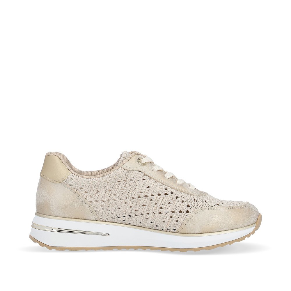 Beige remonte women´s sneakers D1G04-60 with a lacing and perforated look. Shoe inside.