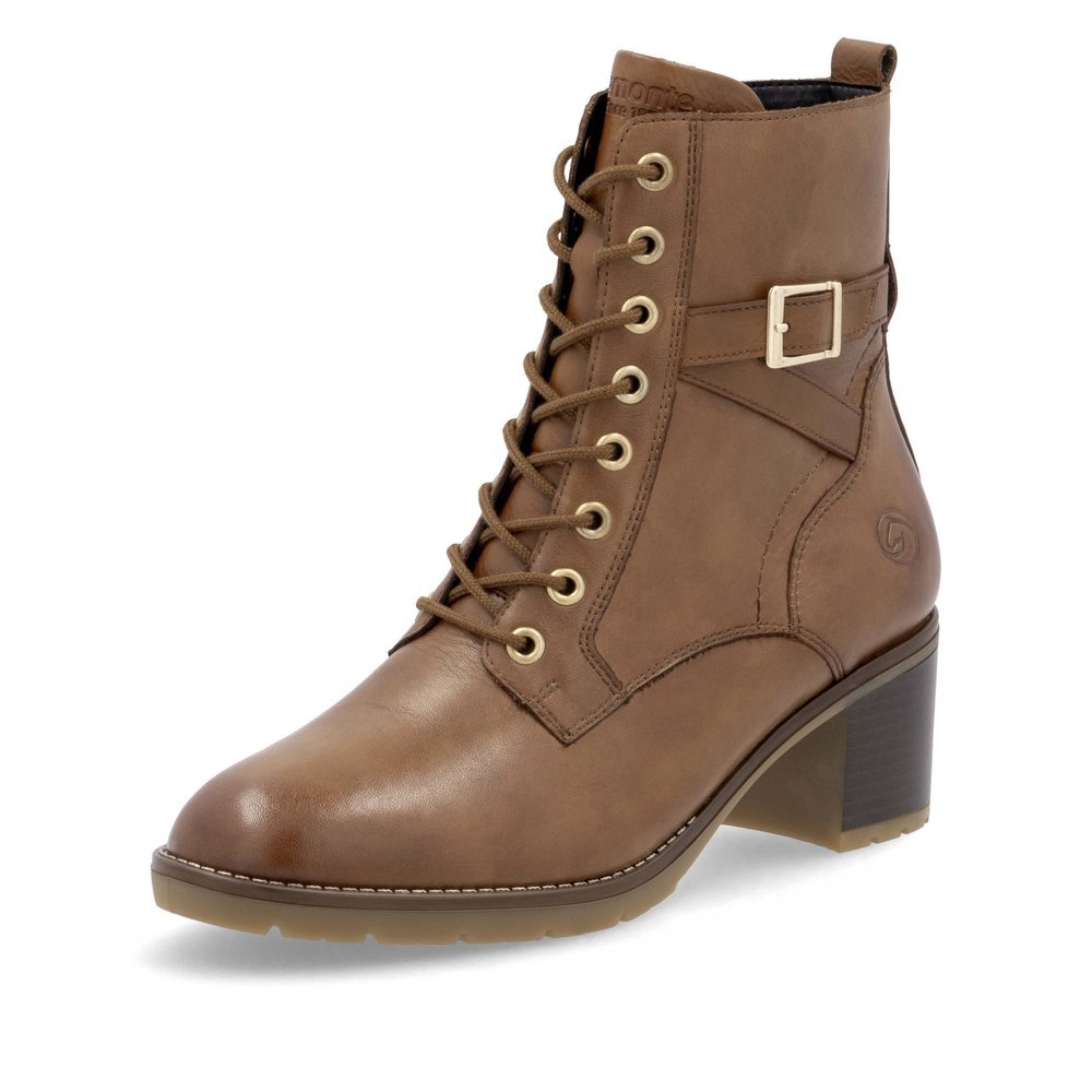 Brown remonte women´s ankle boots D2A74-24 with decorative buckle as well as zipper. Shoe laterally.