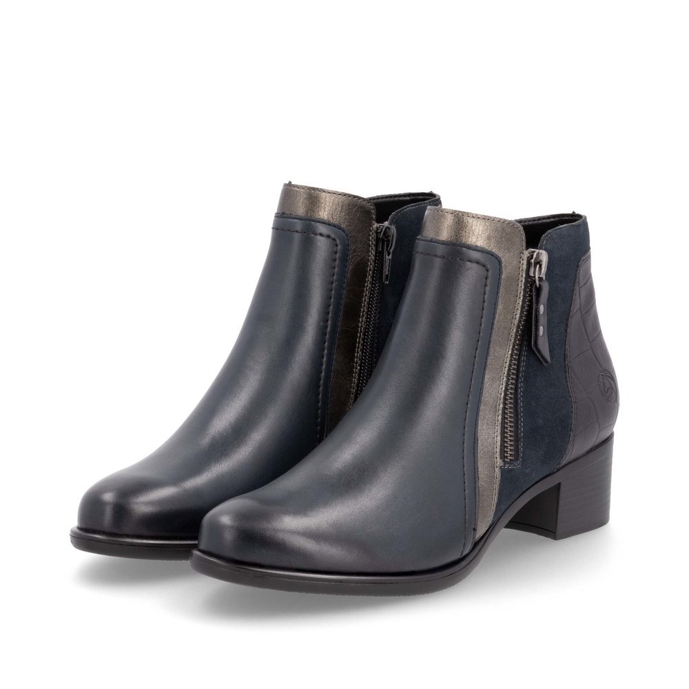 Bottines remonte noires pour femme R5172-14 avec fermeture éclair. Chaussures inclinées sur le côté.