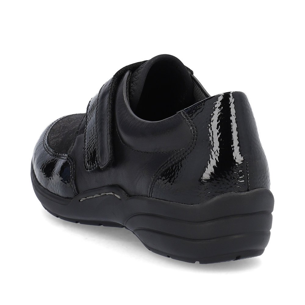 Chaussons remonte noirs pour femme R7600-03 avec fermeture velcro. Chaussure vue de l'arrière.