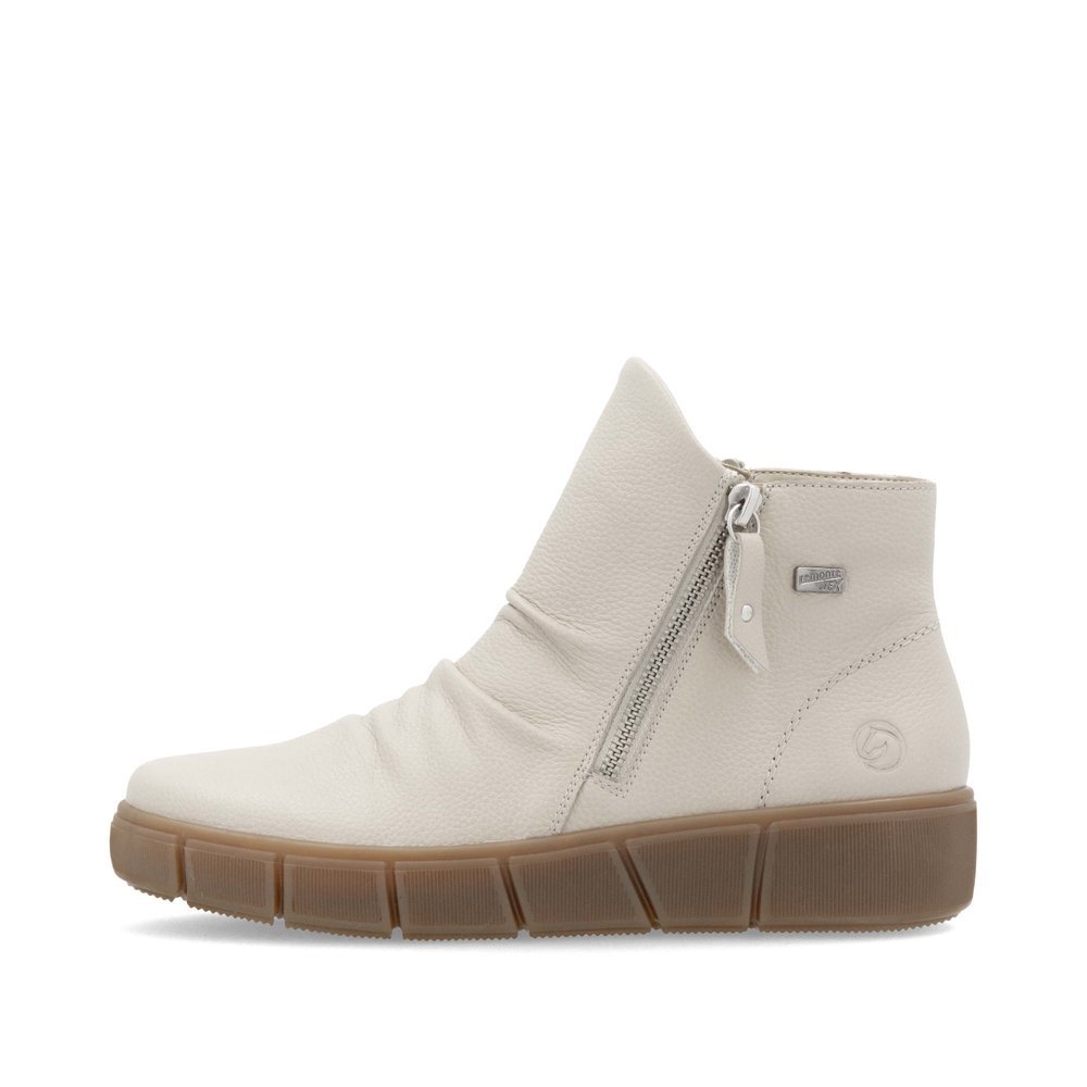 Cream beige remonte women´s ankle boots D1T73-60 with remonteTEX technology. Outside of the shoe.