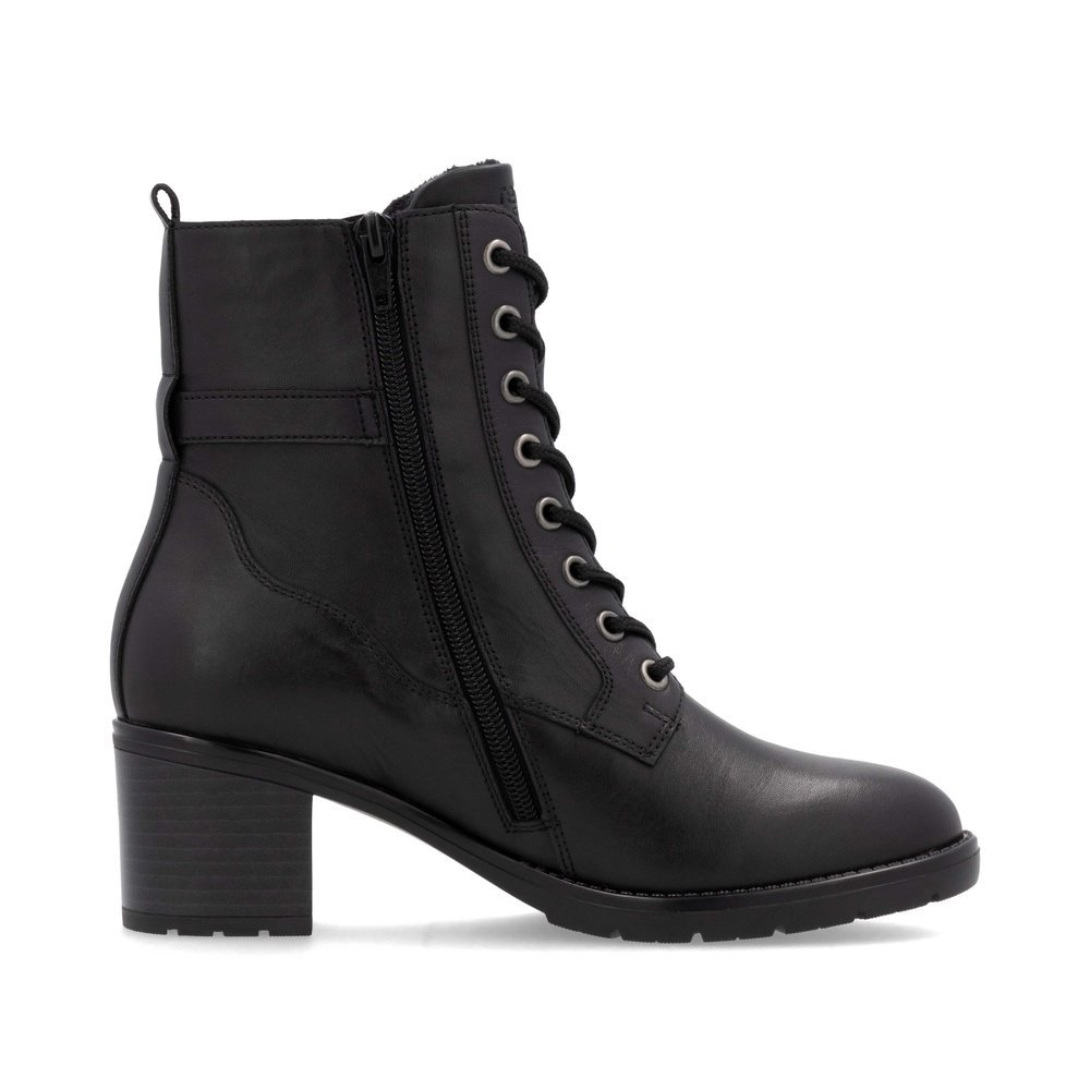 Black remonte women´s ankle boots D2A74-00 with decorative buckle as well as zipper. Shoe inside.