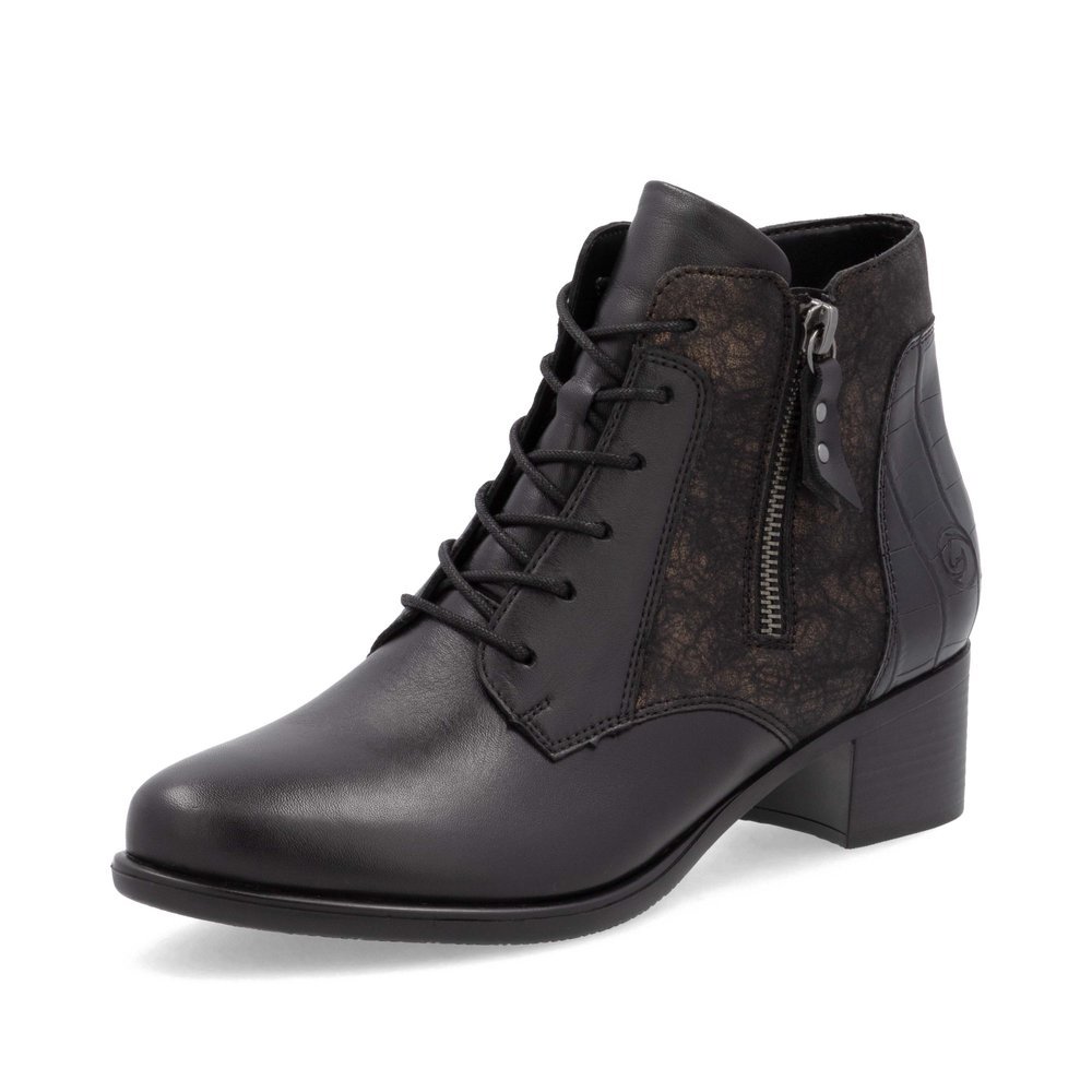 Bottines remonte noires pour femme R5187-03 avec fermeture éclair. Chaussure inclinée sur le côté.