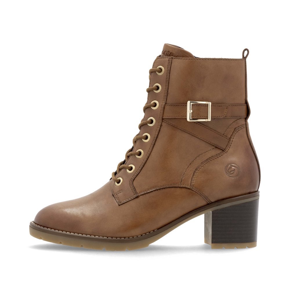 Brown remonte women´s ankle boots D2A74-24 with decorative buckle as well as zipper. Outside of the shoe.