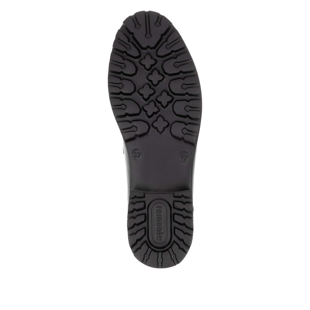 Black remonte women´s loafers D8602-00 with elastic band as well as comfort width G. Outsole of the shoe.