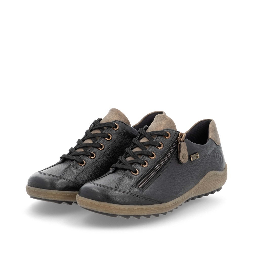 Chaussures à lacets remonte noires pour femme R1402-08. Chaussures inclinées sur le côté.