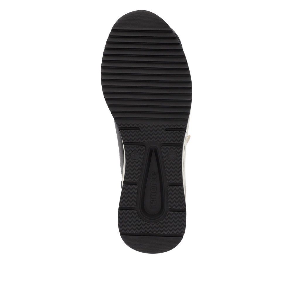 Black remonte women´s sneakers D0T03-01 with a zipper as well as extra width H. Outsole of the shoe.