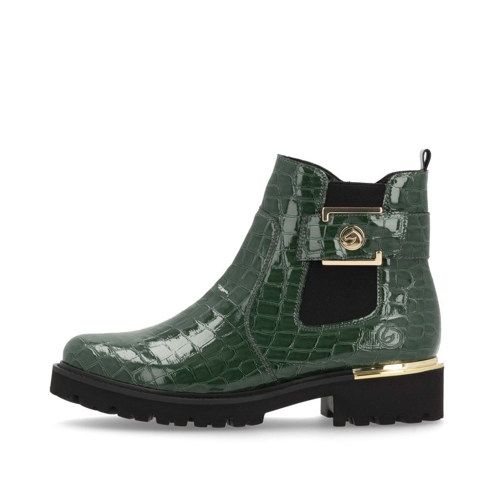 Fir green remonte women´s Chelsea boots D8684-54 with a golden decorative element. Outside of the shoe.