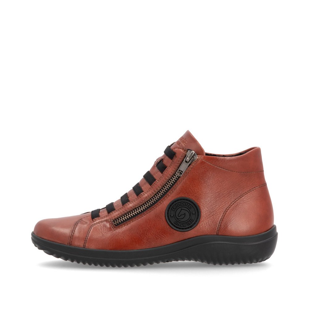 Chaussures à lacets remonte orange pour femme D1E70-38 avec logo noir. Côté extérieur de la chaussure.