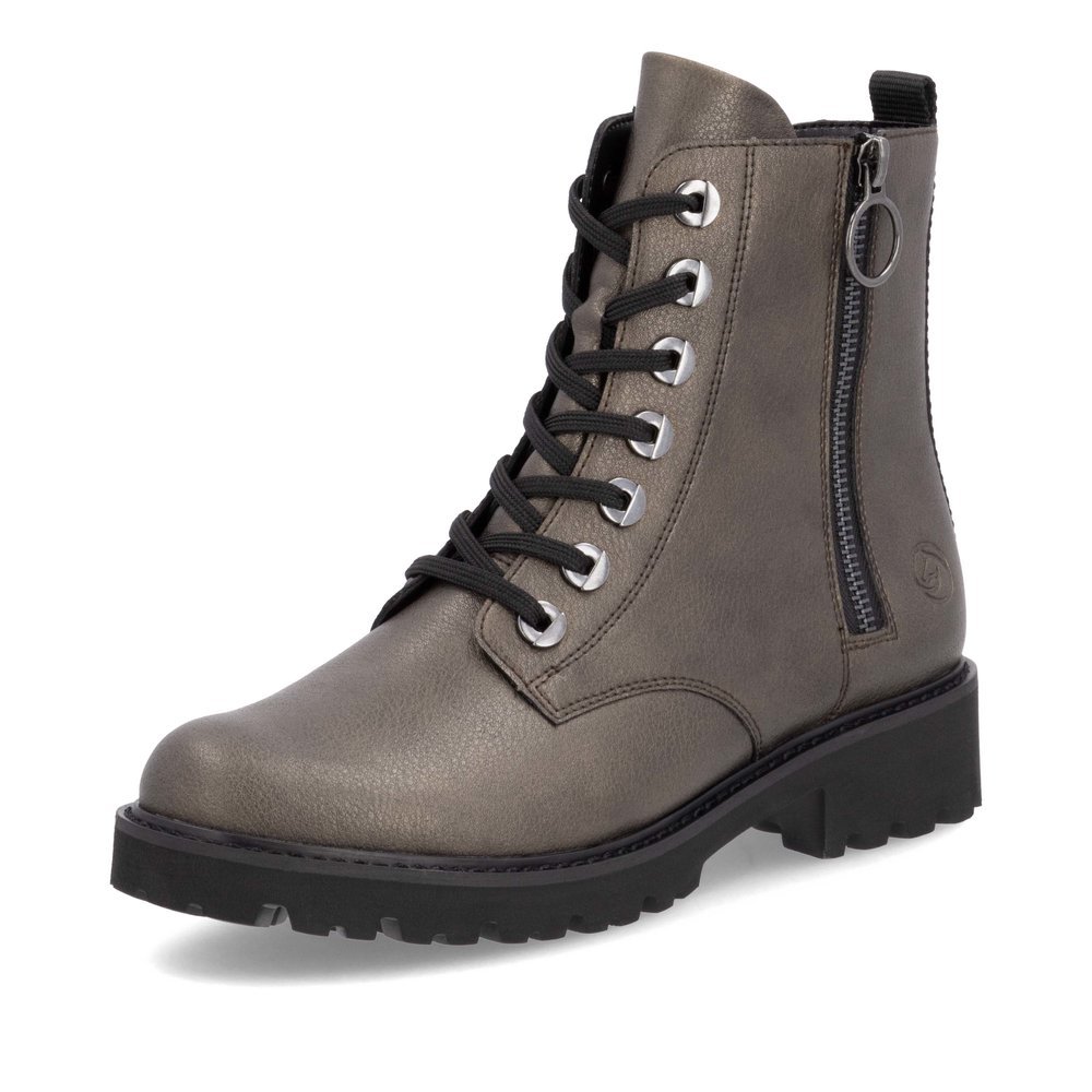 Metallicbraune remonte Damen Biker Boots D8671-92 mit markanten Ösen. Schuh seitlich schräg.