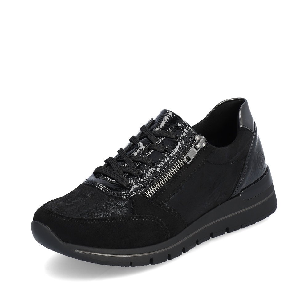 Baskets remonte noires pour femme R6700-03 avec fermeture éclair. Chaussure inclinée sur le côté.