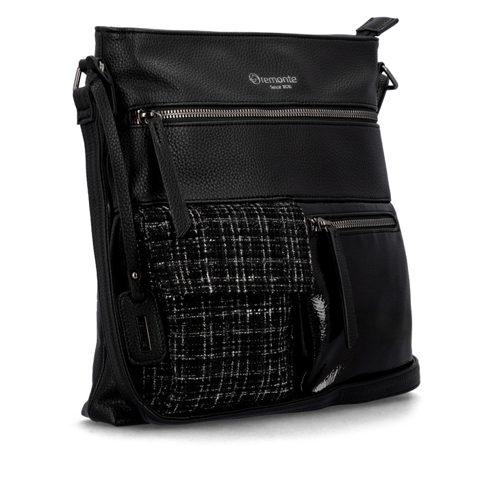 Sac bandoulière remonte Q0729-01 en noir avec des bretelles ajustables et deux poches extérieures. Côté gauche.