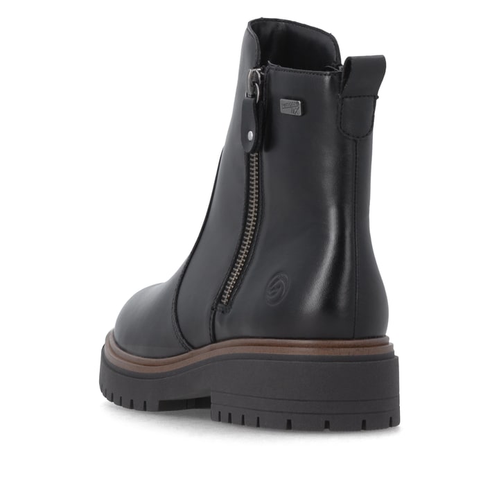 Schwarze remonte Damen Kurzstiefel D4B72-00 mit wasserabweisender TEX-Membran. Schuh von hinten.
