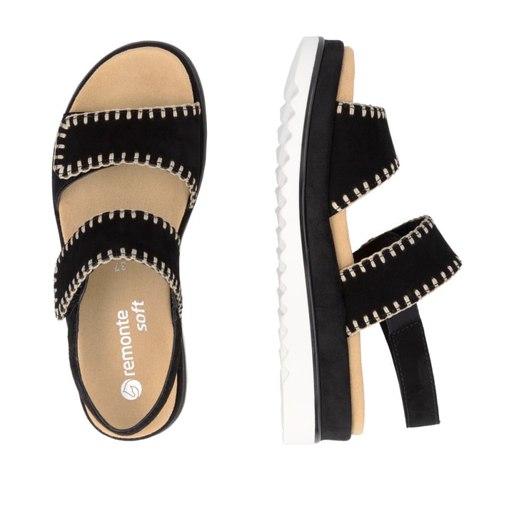 Schwarze remonte Riemchensandalen D3P50-02 mit handgestickten Nähten. Schuh von oben, liegend.
