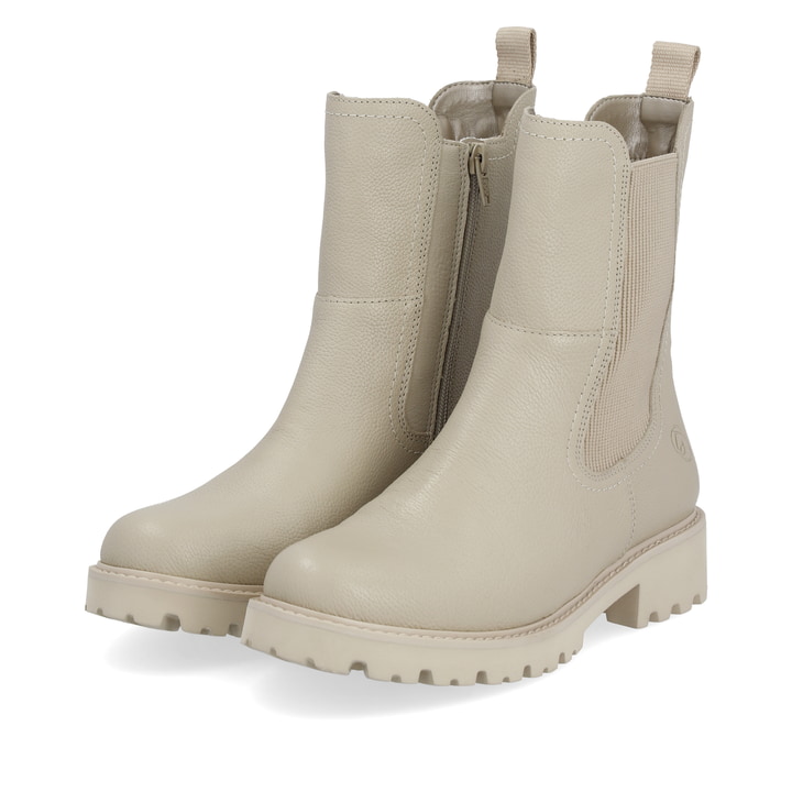 
Cremebeige remonte Damen Chelsea Boots D8694-60 mit einer besonders leichten Sohle. Schuhpaar schräg.
