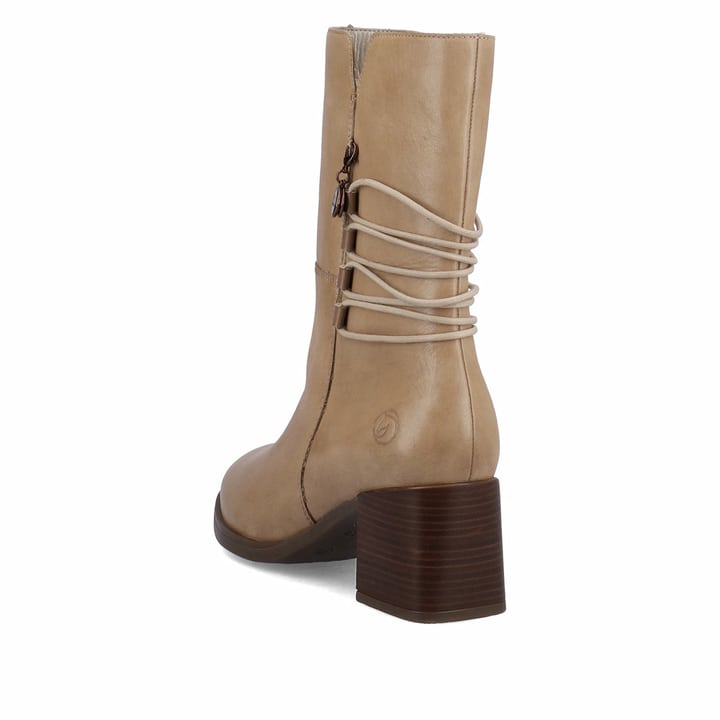 Sandbeige remonte Damen Stiefeletten D0V71-20 mit einer Profilsohle mit Blockabsatz. Schuh seitlich schräg