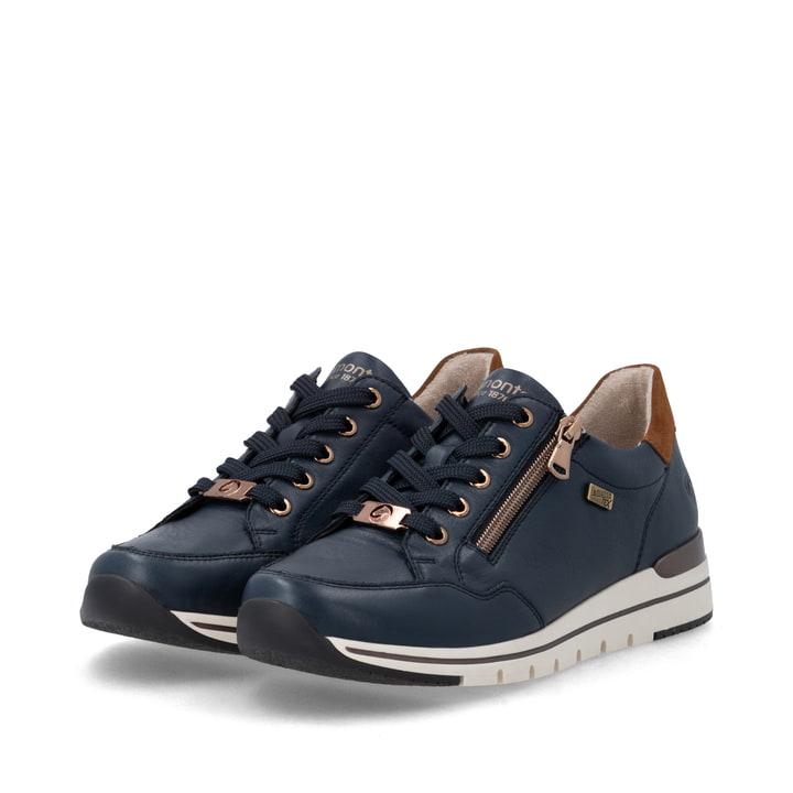 Dunkelblau-braune remonte Damen Sneaker R6716-14. Schuhpaar seitlich schräg.