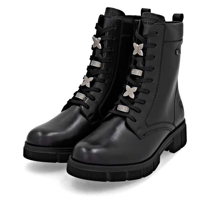 Schwarze remonte Damen Schnürstiefel D2S73-00 mit wasserabweisender TEX-Membran. Schuhpaar seitlich schräg.