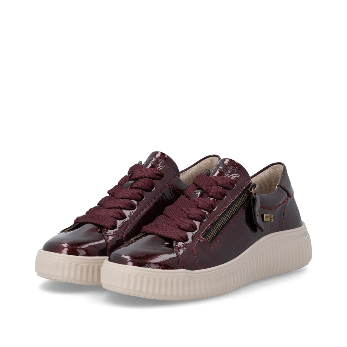 Baskets basses remonte rouges végan pour femmes D3E07-35. Chaussures inclinées sur le côté.