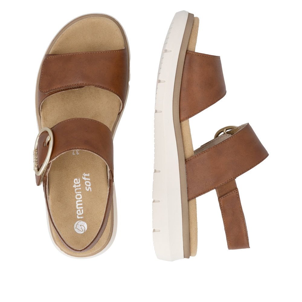 Braune remonte Keilsandaletten D2K50-24 mit trendiger Schnalle. Schuh von oben, liegend.