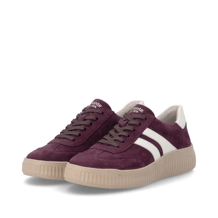 Baskets basses remonte rouges femmes D3E00-30 avec la semelle lightsole+. Chaussures inclinées sur le côté.