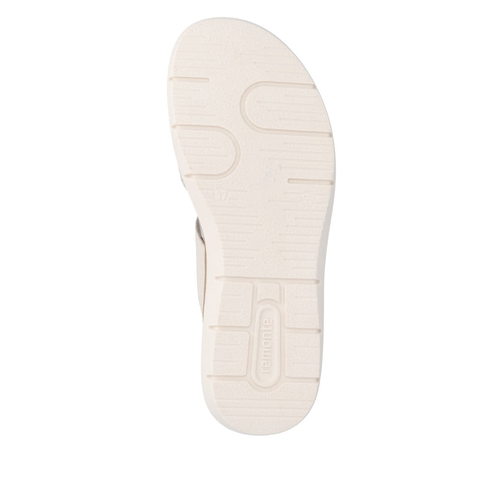 Mules remonte beiges pour femme D2K57-60 avec boucle tendance. Semelle extérieure de la chaussure.