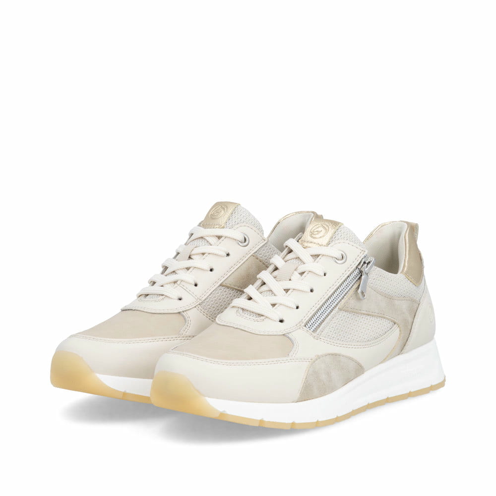 Beigeweiße remonte Damen Sneaker D2G11-60 mit einem Reißverschluss. Schuhpaar seitlich schräg.