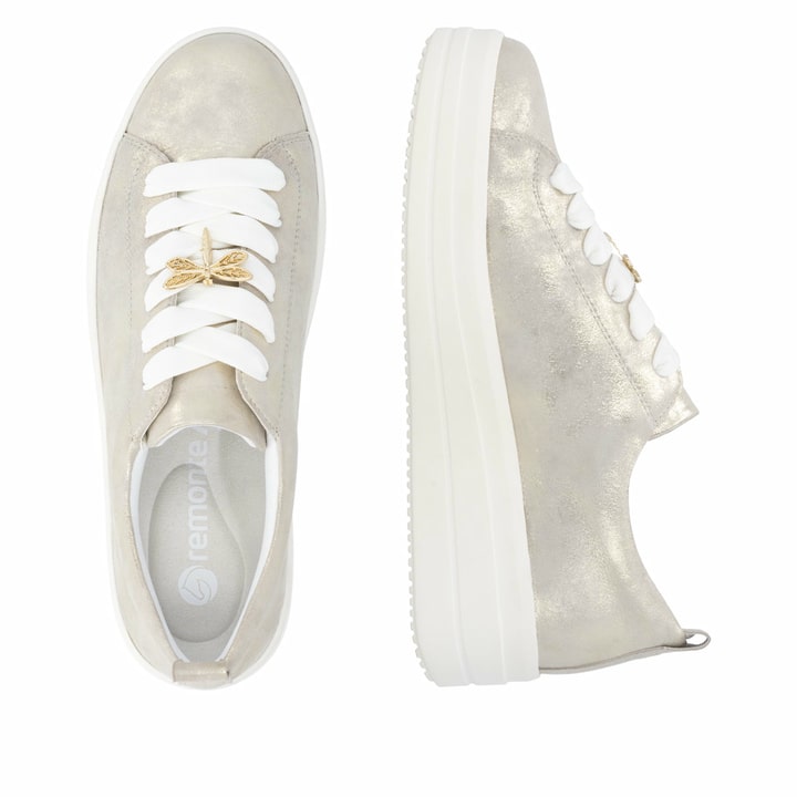 Goldene remonte Damen Sneaker Low D1C03-91 mit dekorativem Schmuckdetail. Schuh von oben, liegend.